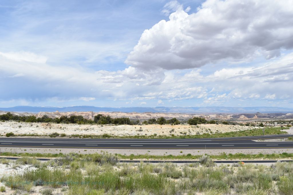 Manti La-Sal Mountains about 55 miles North East taken from Ghost Rock Rest Area, Utah