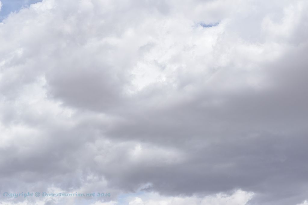 rain clouds over Ghost Rocks